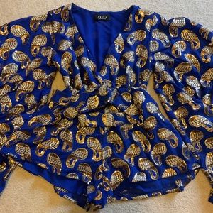 Akira romper. In perfect condition